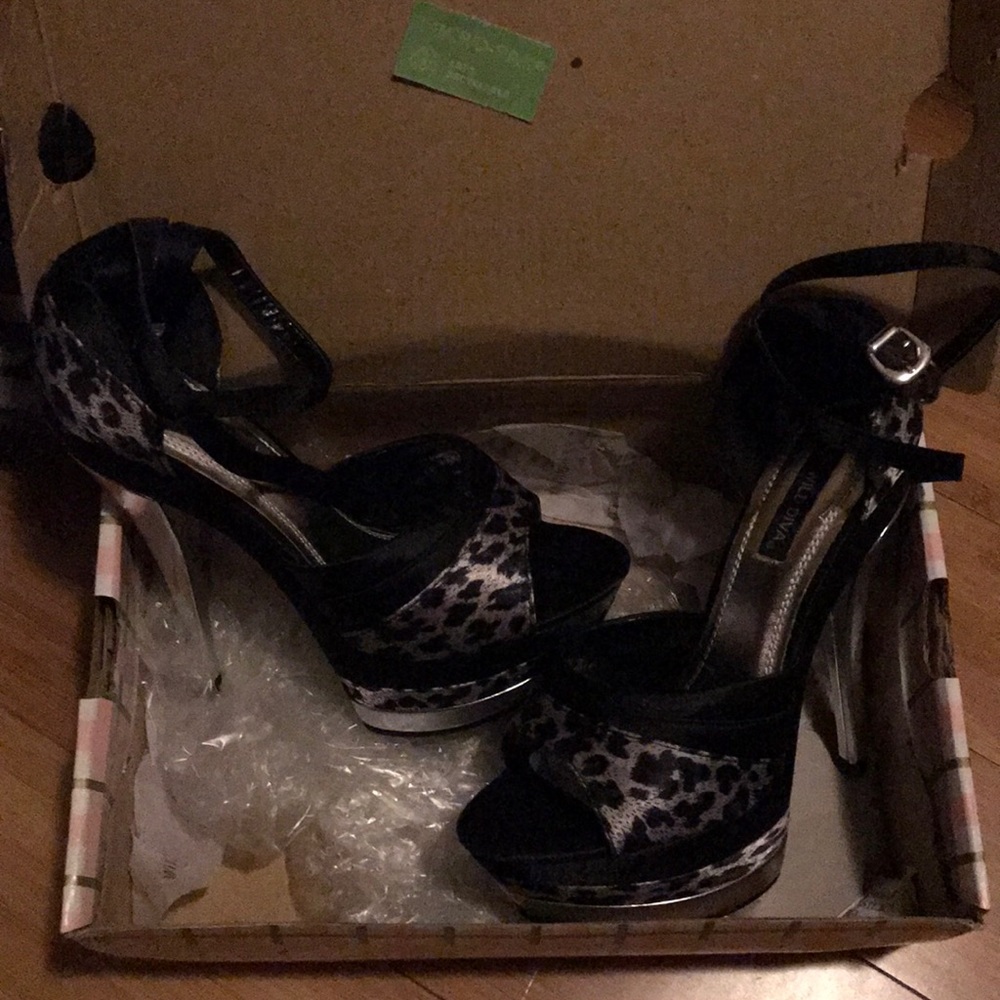 Black leopard platform stilettos
